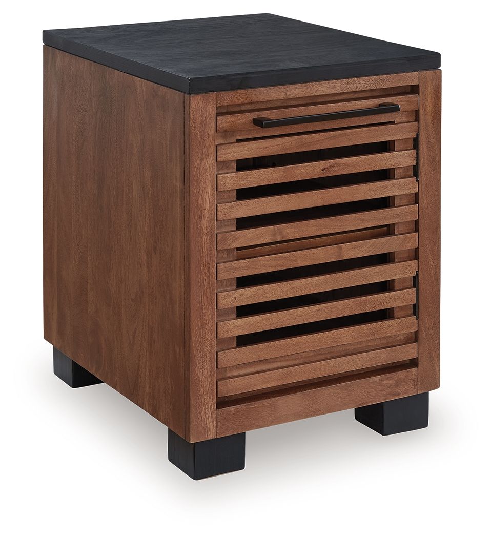 Warm brown chair side end table with black top and slatted storage front