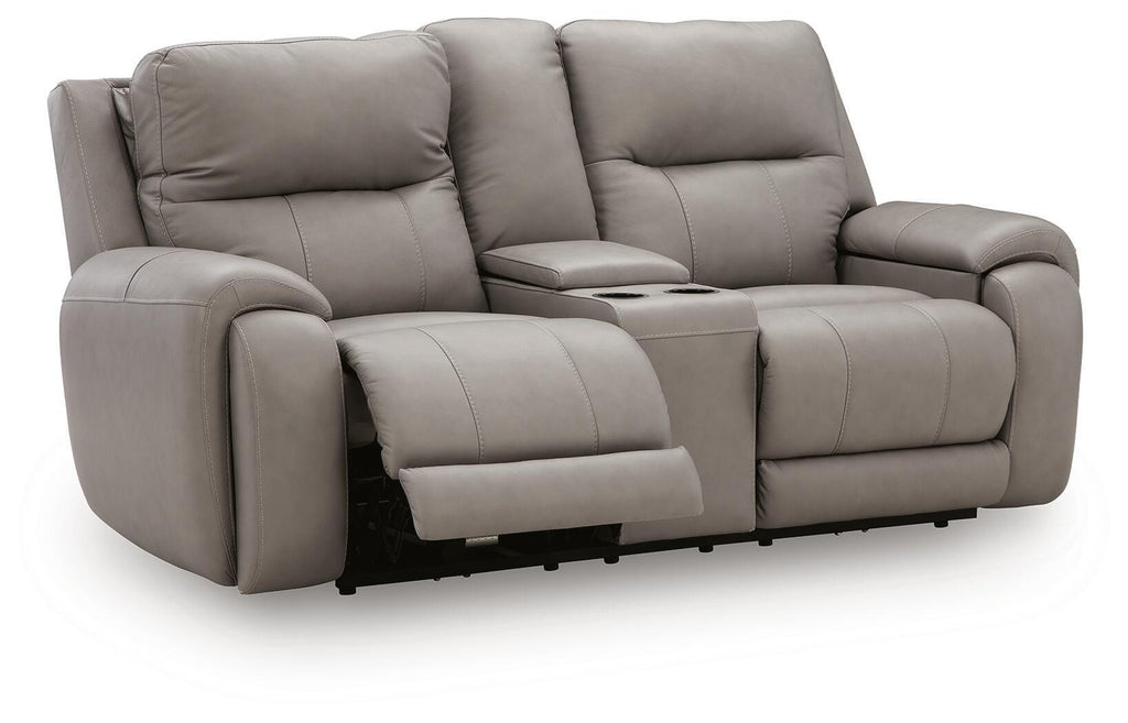 Gray power reclining loveseat with extended footrests and padded arms