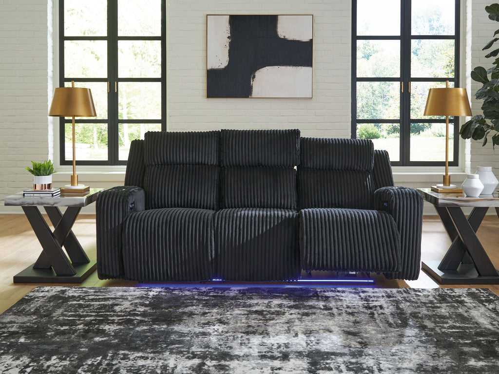 Power reclining sofa with adjustable headrests, black ribbed upholstery, two-seater