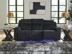 Power reclining sofa with adjustable headrests, black ribbed upholstery, two-seater