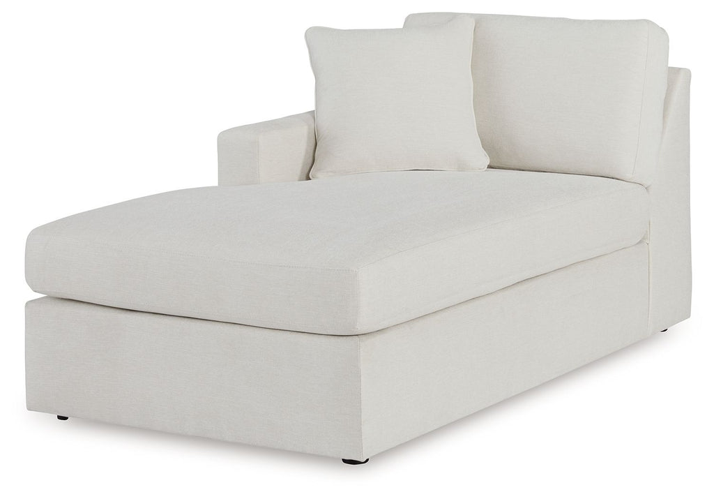 Corner chaise with light oyster upholstery, deep seat and two tall back pillows