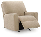 Beige rocker recliner chair with extended footrest and tall back cushion