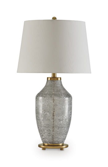 Antique green glass table lamp with a white fabric drum shade and brass base