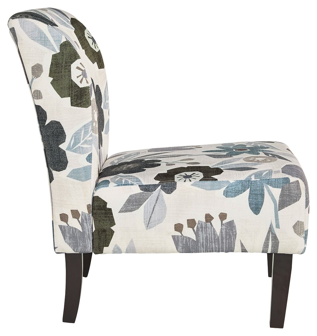Accent chair with blue-gray flower pattern fabric, curved back, dark wood legs.