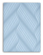 Blue memory foam mattress top with repeating wave lines fabric