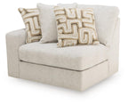 Kestrie LAF corner chair, light beige upholstered seat with two decorative geometric pillows
