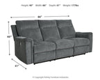 Power reclining sofa with three back segments and padded arms, gravel gray fabric