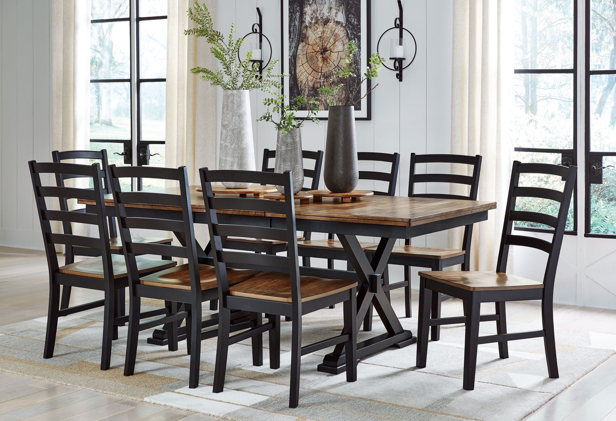 Dining table set with multiple dark wooden chairs