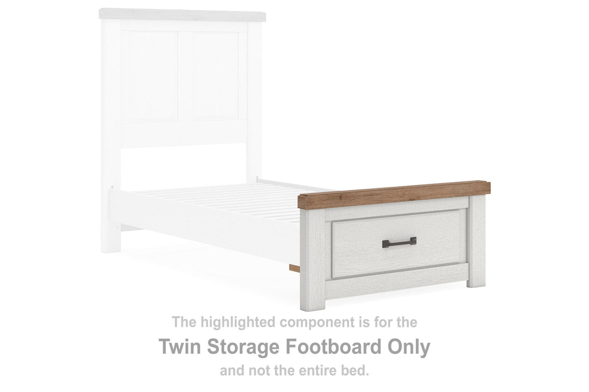 White storage footboard with brown top and gray drawer front with metal handle