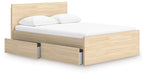 Light brown wood platform bed with panel headboard and side storage drawer fronts.
