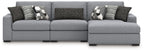 Gray sectional sofa with center console and patterned throw pillows