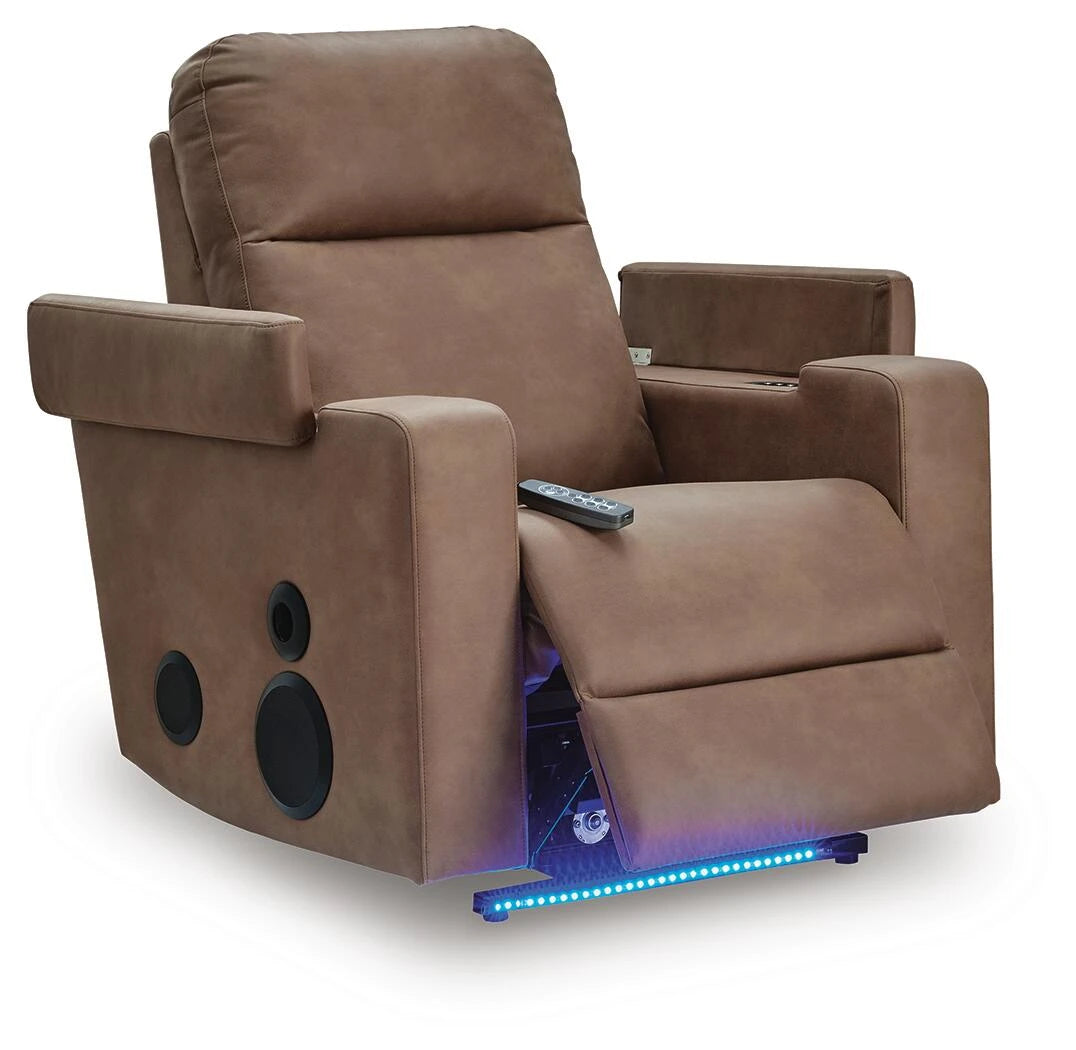 Caramel power recliner angled view with LED base lighting and remote