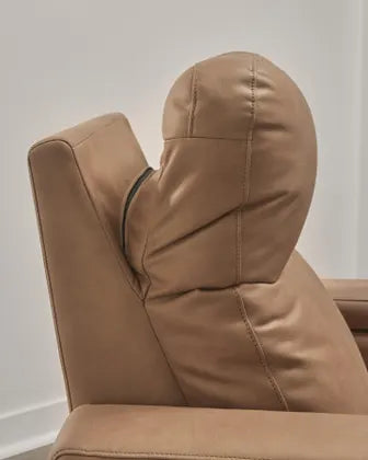 Caramel recliner armrest and headrest with stitched seams