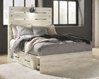 Youth bedroom bed set with paneled headboard, light wood frame, and gray comforter