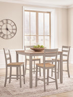 Dining table with light wood top and four gray chairs