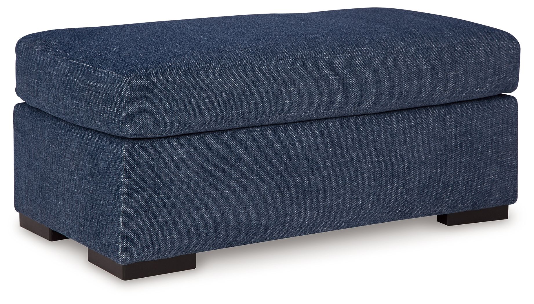Blue upholstered ottoman with large cushioned top and square base