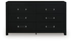 Black six-drawer dresser with three stacked drawers and silver bar pulls, front view.
