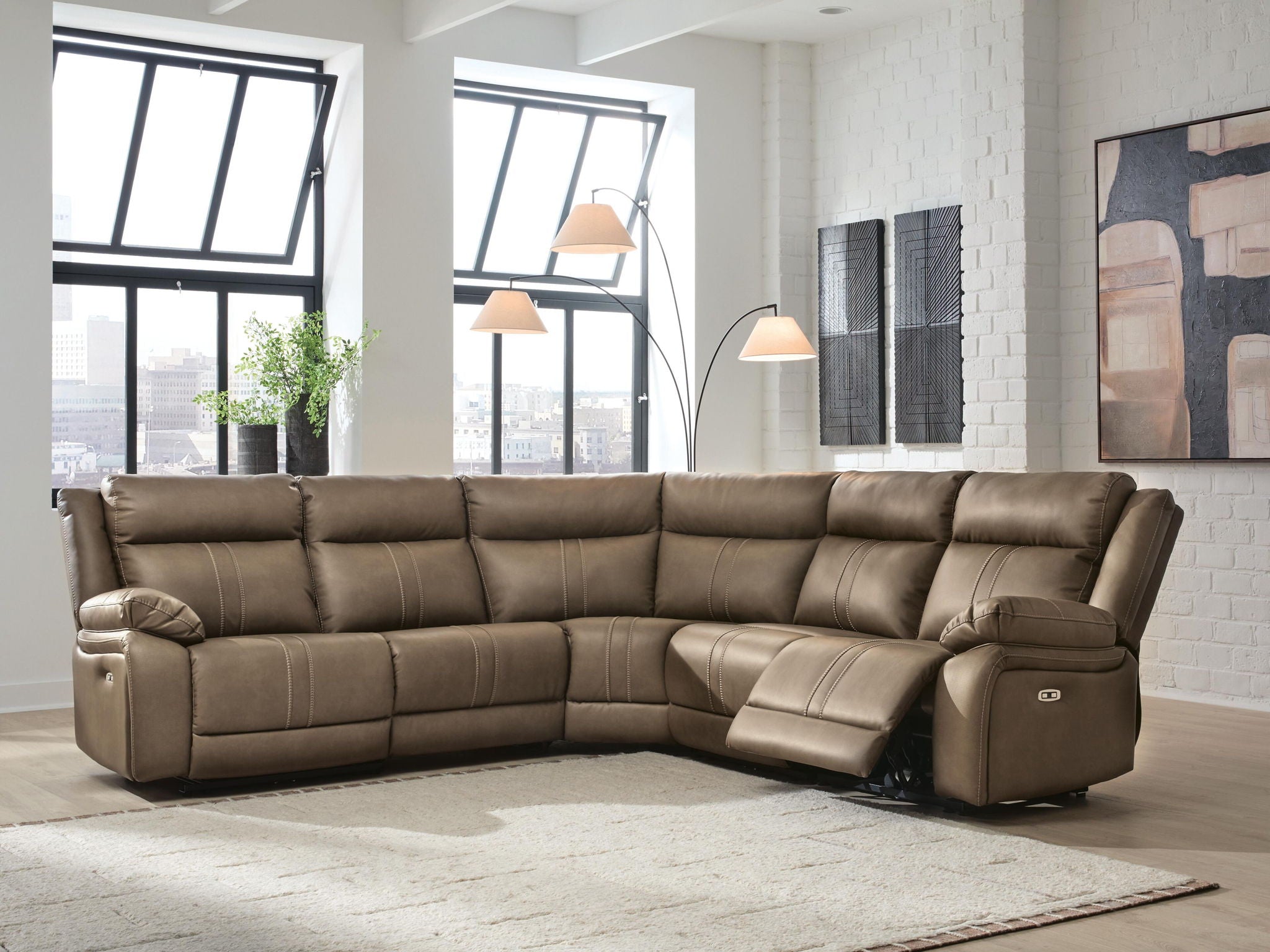 Taupe-brown power reclining sectional sofa with chaise and recliner footrest