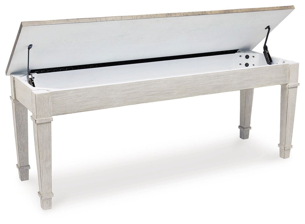 White storage bench with open lid showing storage compartment and metal lift brackets