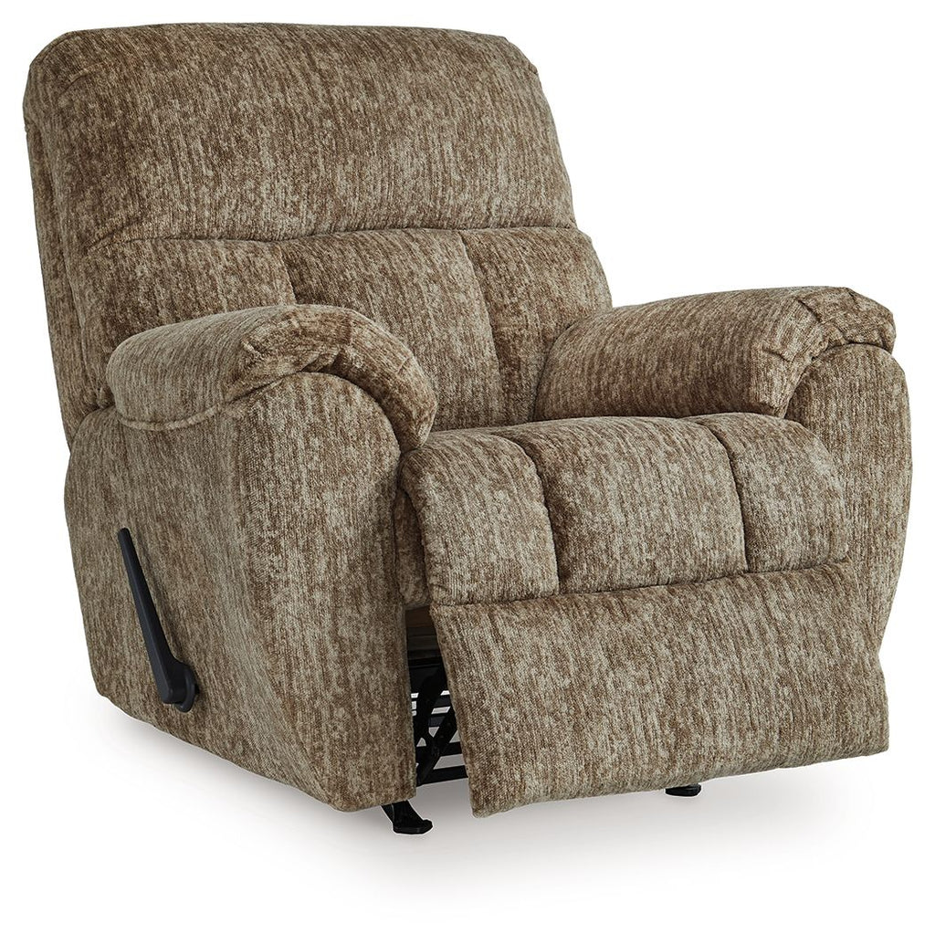 Taupe rocker recliner chair with padded arms and panel stitching, side lever