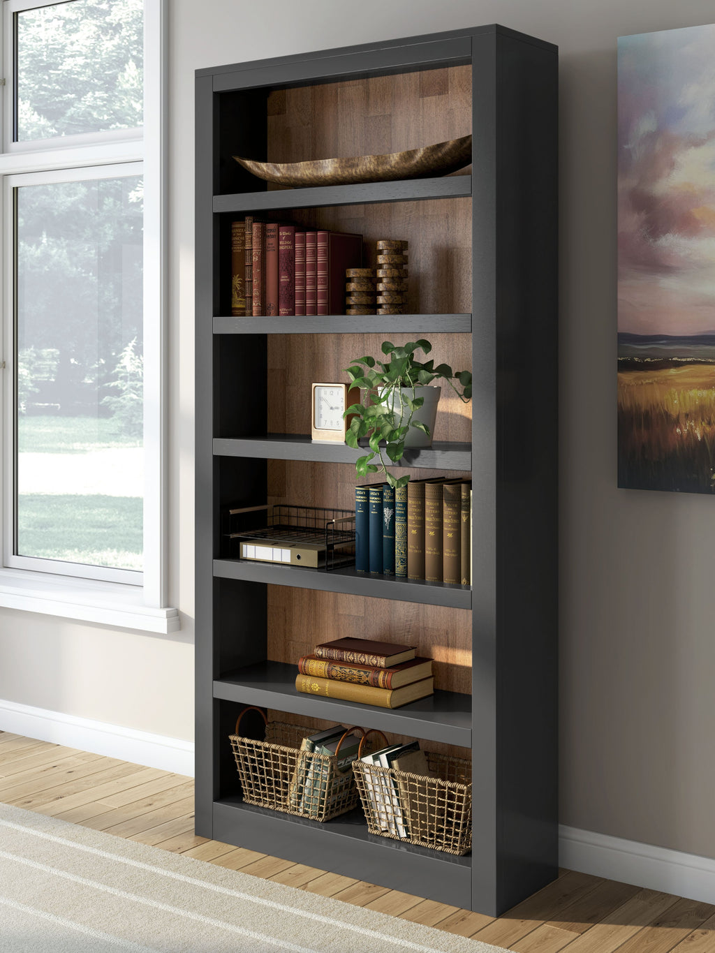 Brown and black bookcase with shelves holding books, decor, and baskets