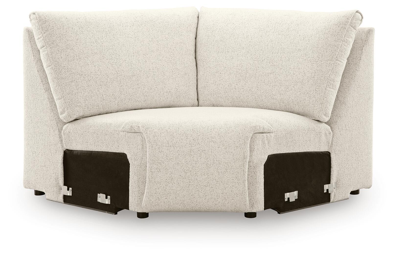 Light beige upholstered sectional wedge with two back cushions and short arms