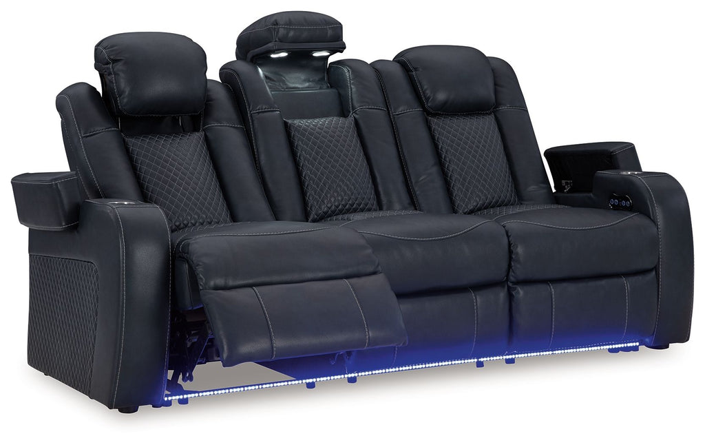 Dark gray reclining living room set reclining sofa with padded arms, tufted back, blue-lit base