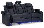 Dark gray reclining living room set reclining sofa with padded arms, tufted back, blue-lit base