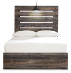 Dark wood panel bed with slatted headboard and footboard, white mattress and pillows
