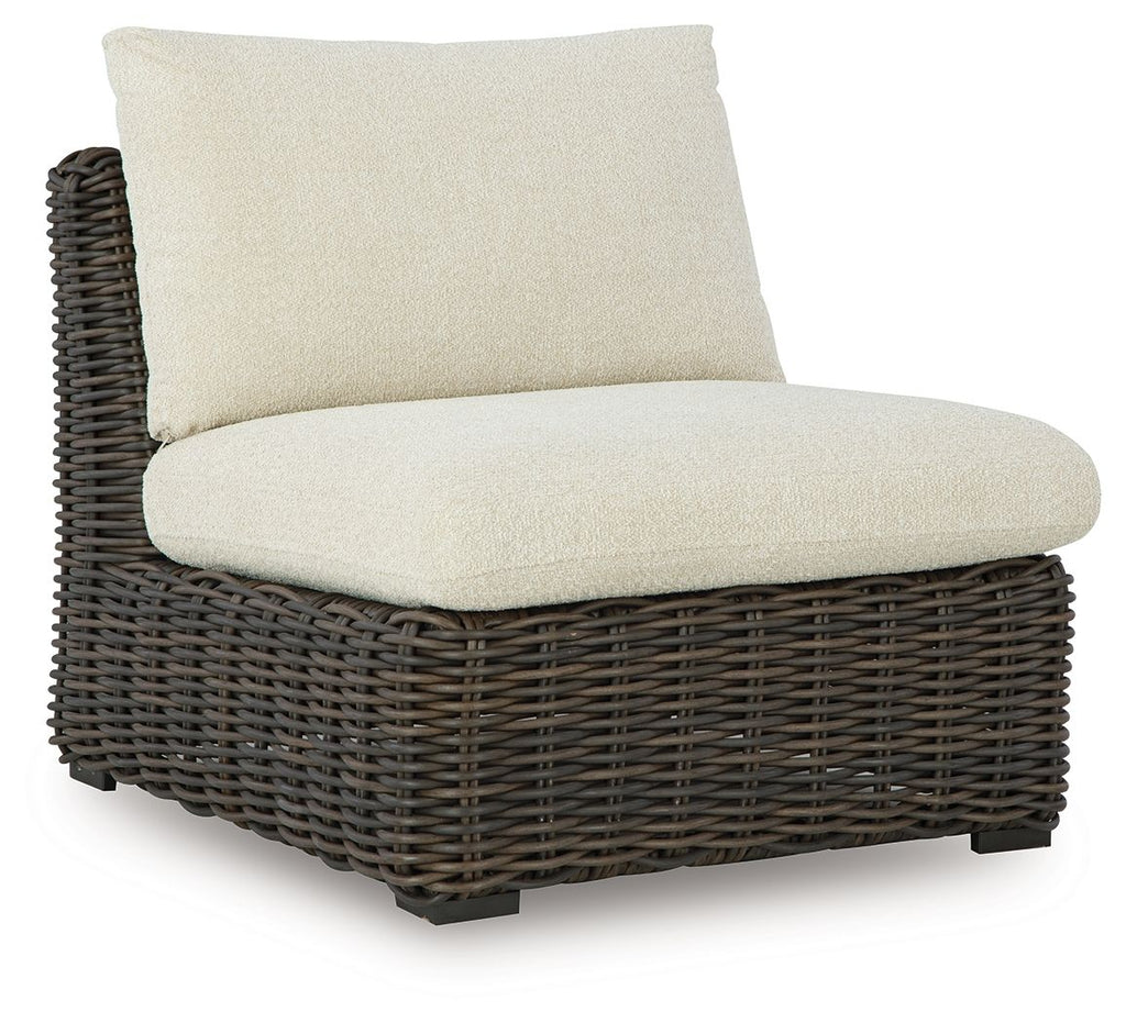 Armless wicker chair with beige cushion, dark brown frame