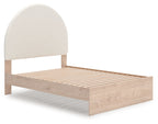 Upholstered panel bed with beige headboard and light wood slatted base