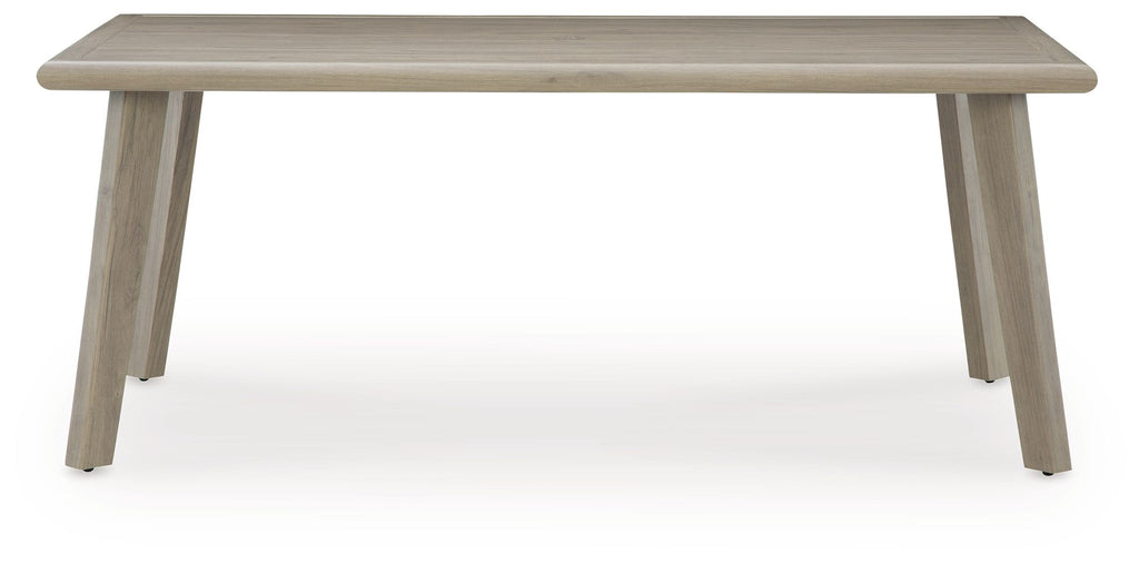 Beige rectangular dining table front view with smooth tabletop and tapered legs
