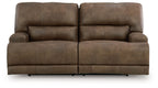 Earth-tone 2-seat power reclining sofa with adjustable headrests, wide padded back and seat