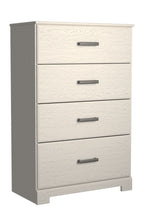 White chest of drawers with four drawers and metal bar handles