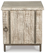 Whitewashed accent cabinet with two front doors, ring handle, and dark metal hinges