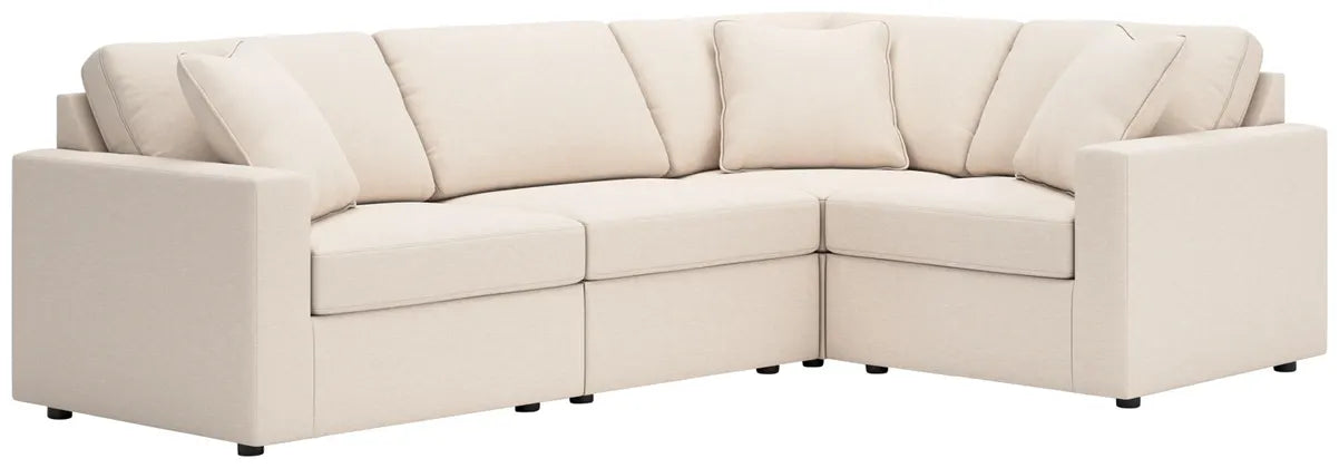Beige fabric sectional sofa with wedge corner, box cushions, and track arms