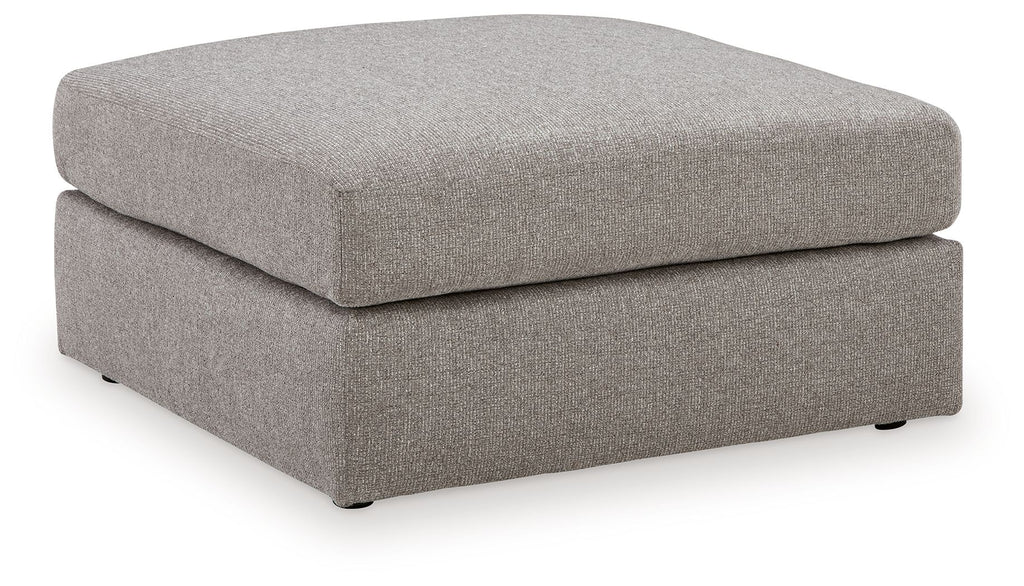 Smoke gray oversized ottoman with upholstered top and block legs
