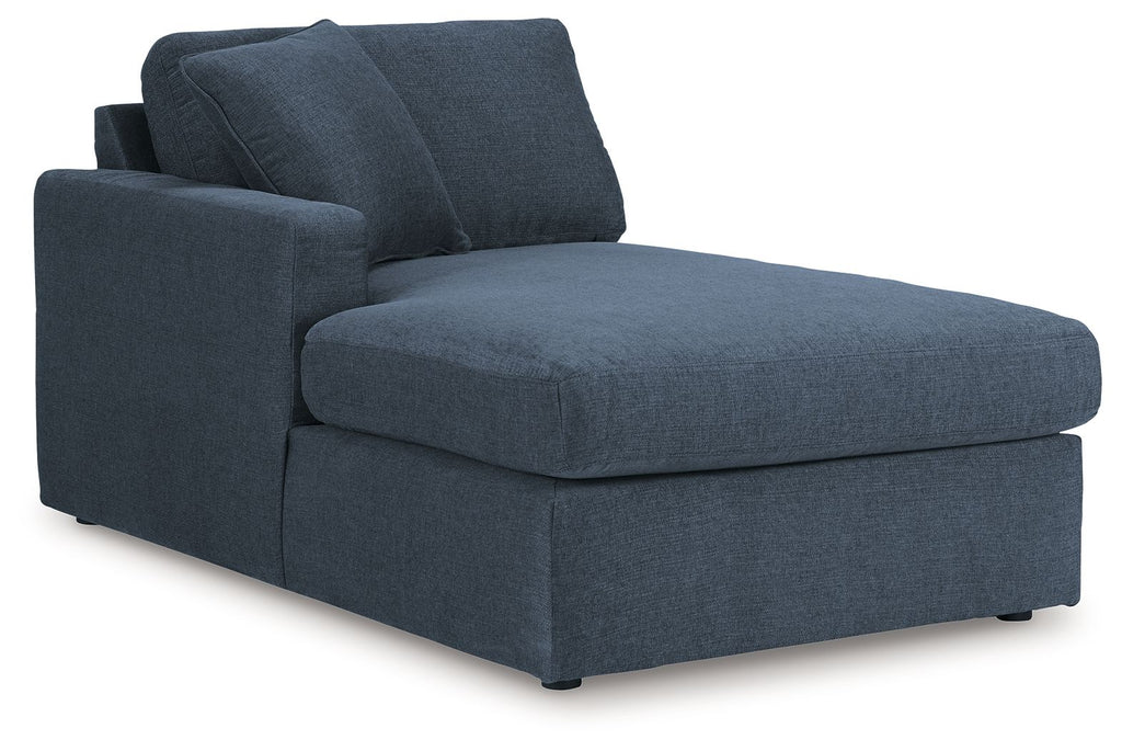 Ink blue corner chaise with upholstered seat and back cushions