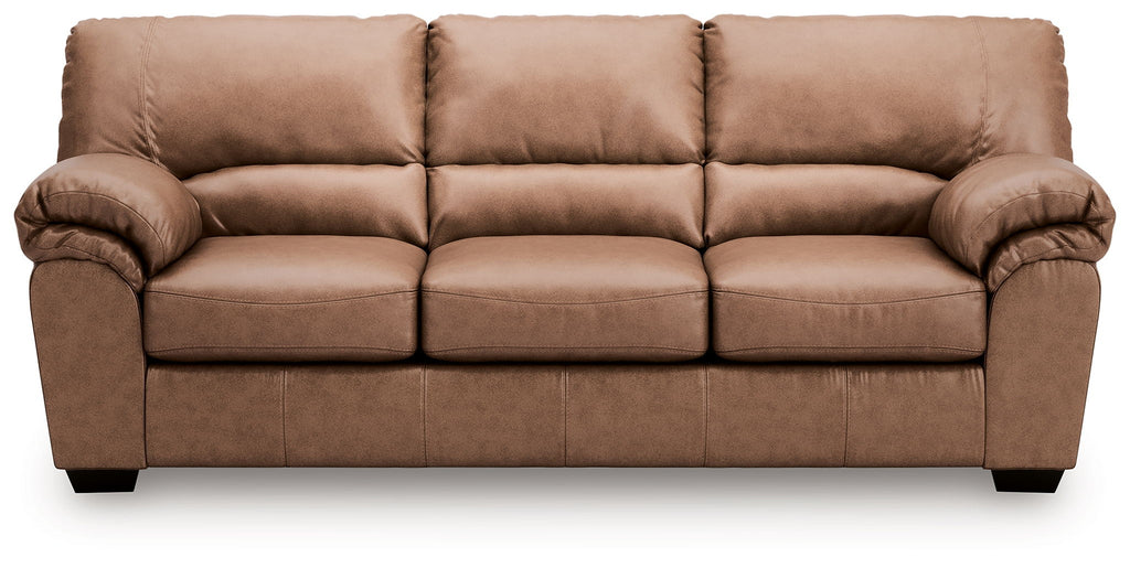 Light brown 3-seat sofa with tufted back, padded arms, and segmented seat cushions