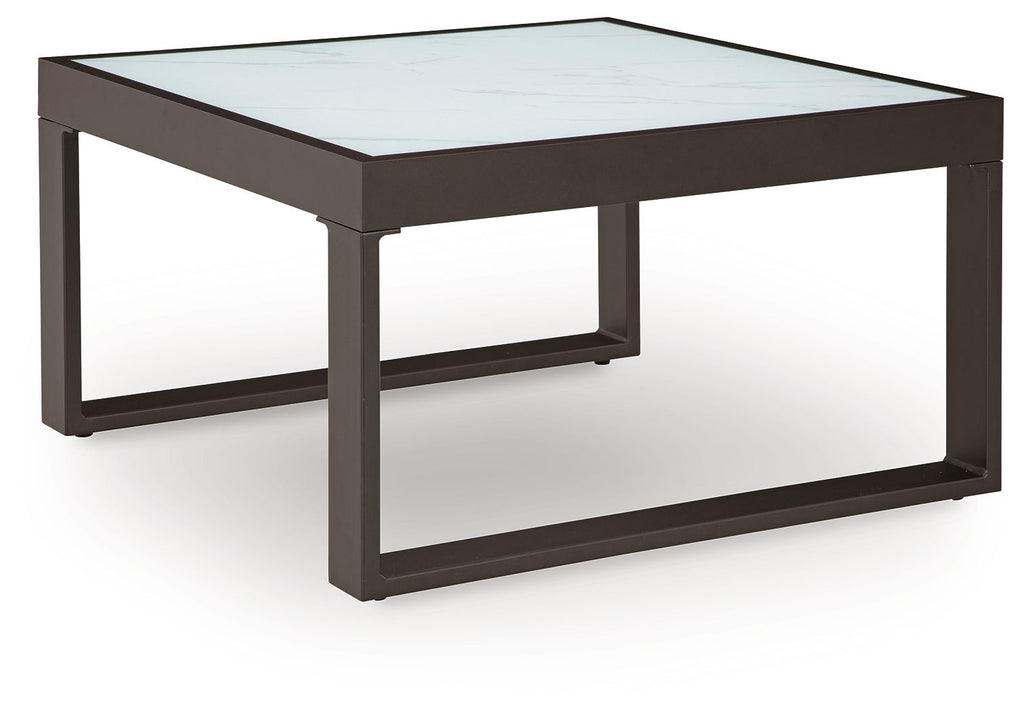 Square cocktail table with light gray marble-style top and dark black frame