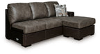 Sectional sofa chaise in dark fossil brown upholstery, with patterned accent pillow