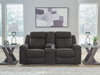Charcoal double reclining loveseat with center console and cushioned arms
