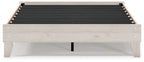Light beige platform bed frame with black slat support and timber panels