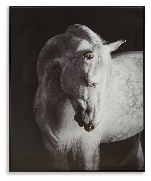 Black-framed wall art print of a black-and-white horse head