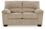 Beige corduroy loveseat with rolled arms, tufted back, and cushioned two-seat panel
