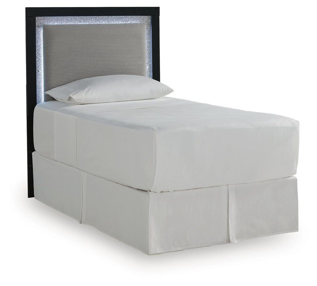 Light gray upholstered panel headboard with dark side frame and textured inset.