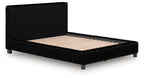 Black upholstered bed with vertical channel headboard and padded platform frame.