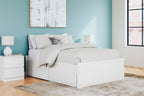 White upholstered-looking platform bed with two side drawers and slat base