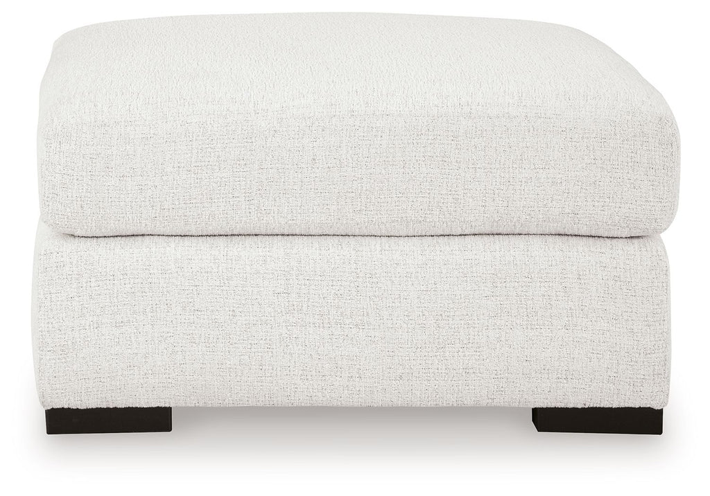 Oversized accent ottoman in chalk with rounded top and black base feet