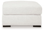 Oversized accent ottoman in chalk with rounded top and black base feet